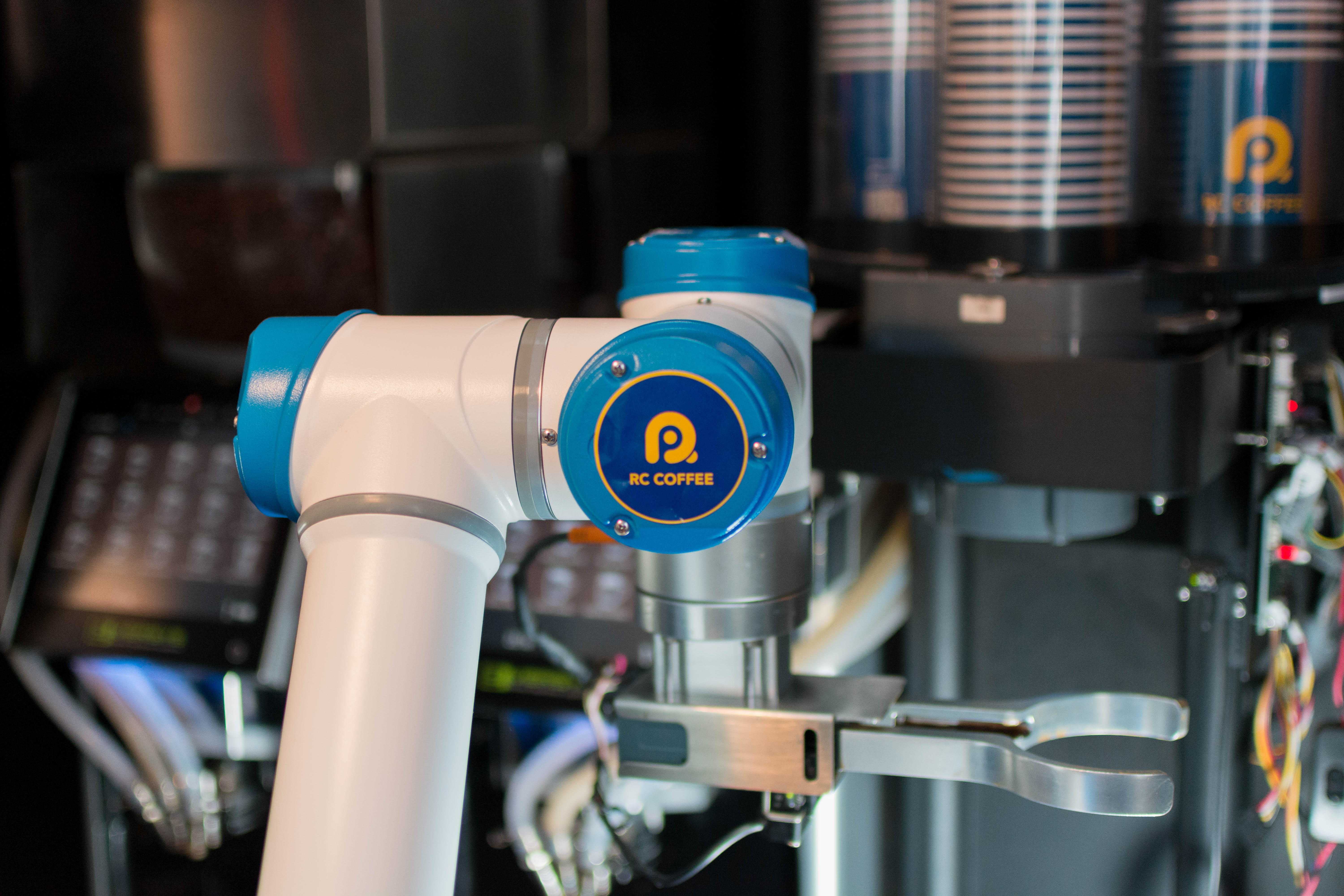 Robotoic coffee machine arm
